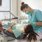 “예비 치대생 기다립니다” Orthodontist treating her patient in dental office